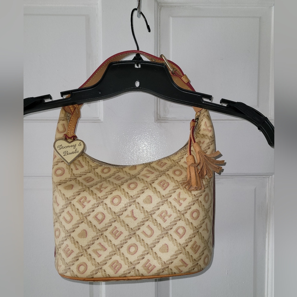 Dooney & Bourke Coated Canvas Signature Logo Charm Bucket Bag, Ivory